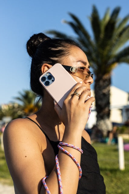 Universal phone patch designed to convert any iPhone, Samsung, or Huawei model into a crossbody phone case. This versatile accessory features a durable adhesive back that attaches securely to your smartphone, allowing you to add a crossbody strap for hands-free convenience.