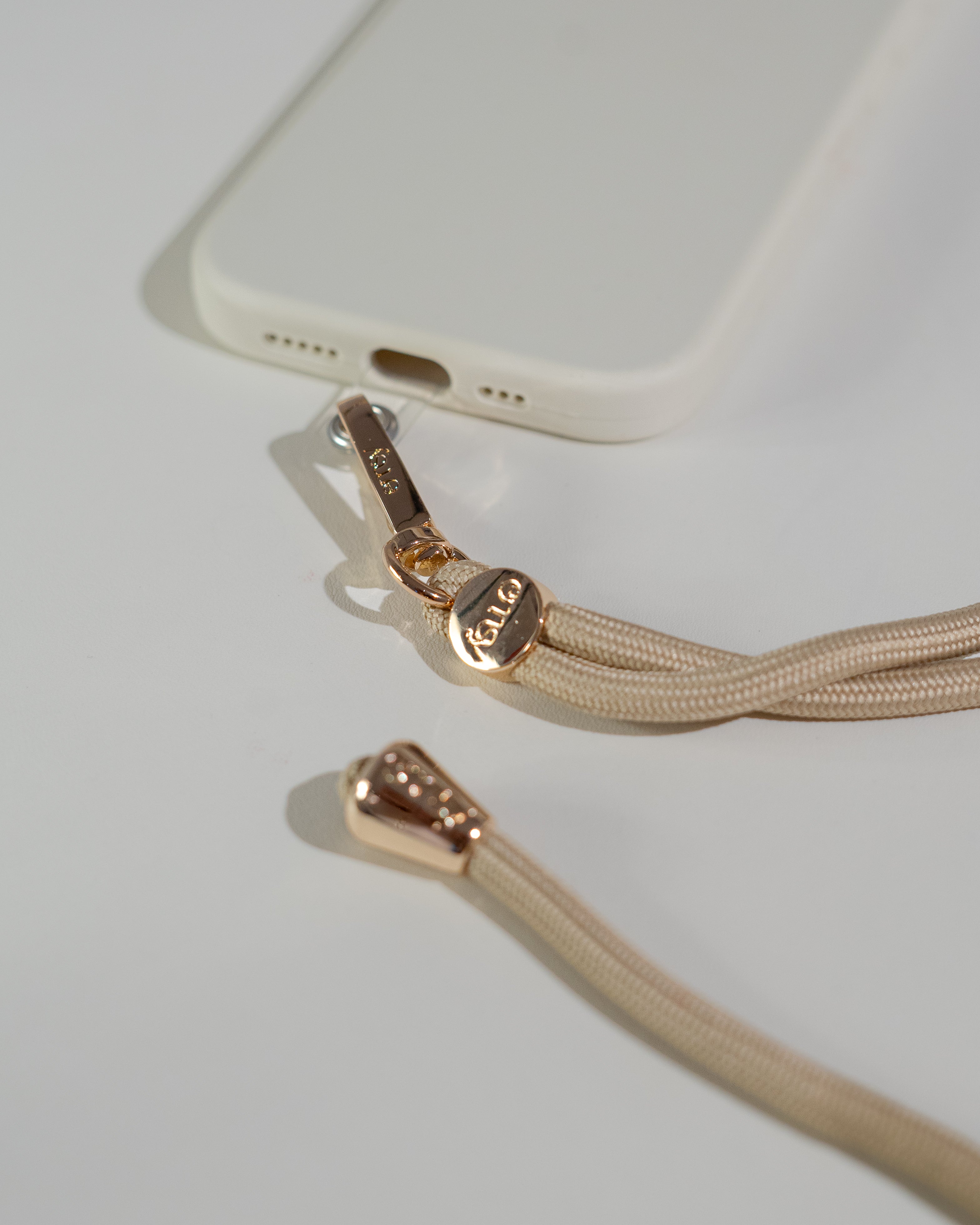 Universal phone patch designed to convert any iPhone, Samsung, or Huawei model into a crossbody phone case. This versatile accessory features a durable adhesive back that attaches securely to your smartphone, allowing you to add a crossbody strap for hands-free convenience. Ideal for on-the-go activities, it ensures your phone is always accessible while providing a modern, practical way to carry your device. Perfect for those who value functionality and style.