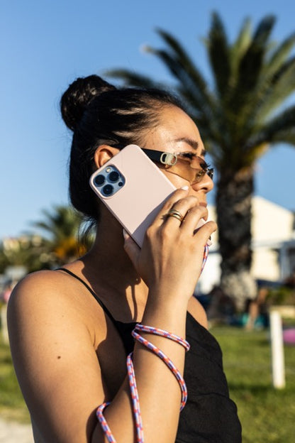 Universal phone patch designed to convert any iPhone, Samsung, or Huawei model into a crossbody phone case. This versatile accessory features a durable adhesive back that attaches securely to your smartphone, allowing you to add a crossbody strap for hands-free convenience.