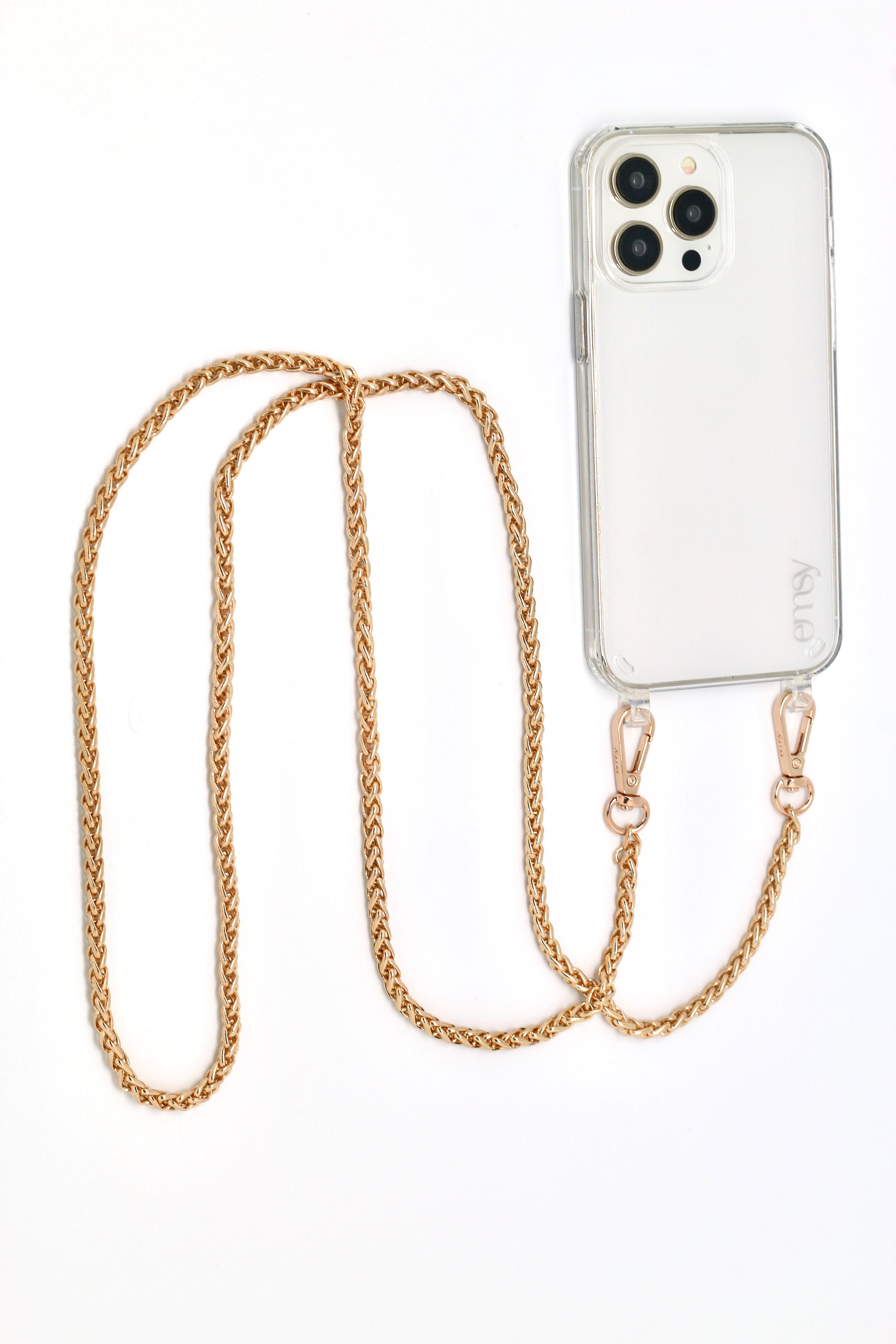 Close-up of the Casablanca adjustable crossbody strap in premium vegan leather, featuring a sleek, clear design with gold hardware. Perfect for hands-free phone cases and wristlets, adding style and functionality to any outfit.