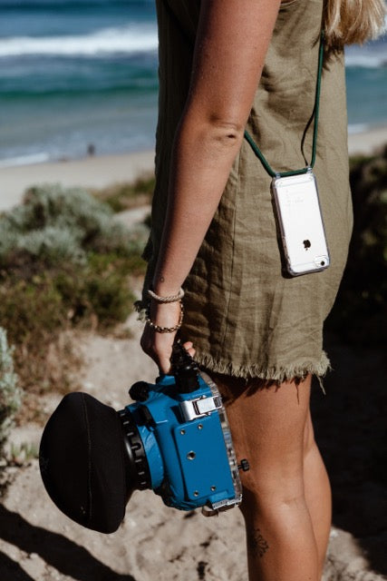 Emsy Australia's crossbody phone cases are designed for iPhone and Samsung models, providing stylish and durable protection. These fashionable phone cases feature secure, sturdy cords and come with various options like chain straps, utility wrist straps, or rope wrist straps, ensuring your phone stays safe while allowing hands-free convenience. Elevate your mobile accessory game with our trendy coloured ropes that complement any style. Explore our extensive collection, which includes the versatile 2-in-1 ut